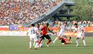 Ranti Martins tries to dribble past Penn Orji..jpg
